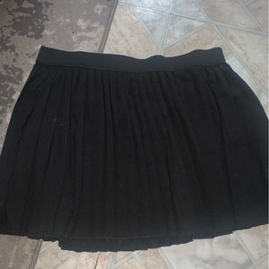 black pleated skirt